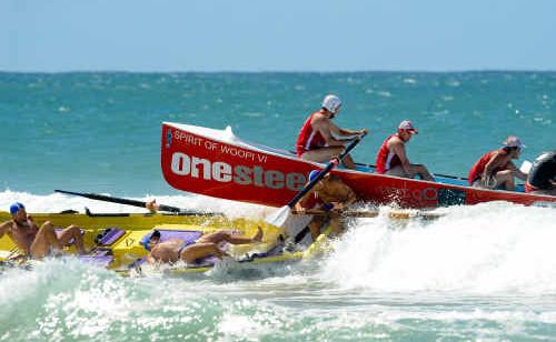 Bonny Hills second stroke Josh Baker finds himself under the bow of Woolgoolga’s boat, while stroke (middle) Paul Ward and “The Big Bowman” Chad McCarron duck for cover. Bonny Hills second stroke Josh Baker finds himself under the bow of Woolgoolga’s boat, while stroke (middle) Paul Ward and “The Big Bowman” Chad McCarron duck for cover.